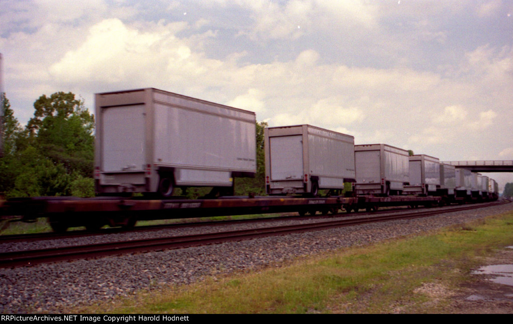 A long string of UPS trailers